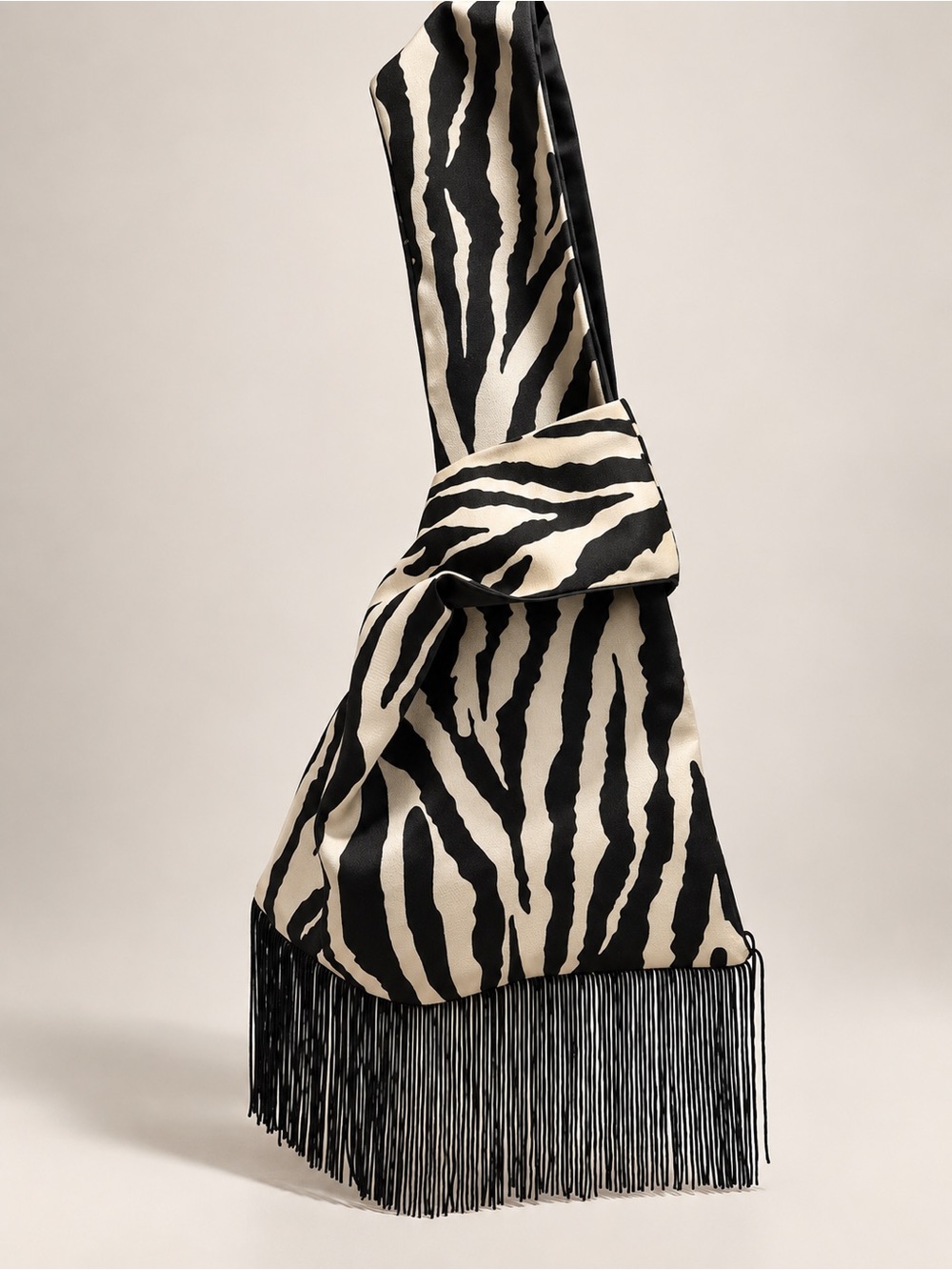 Zebra-Print Fringe Accent Bag – Black & Cream